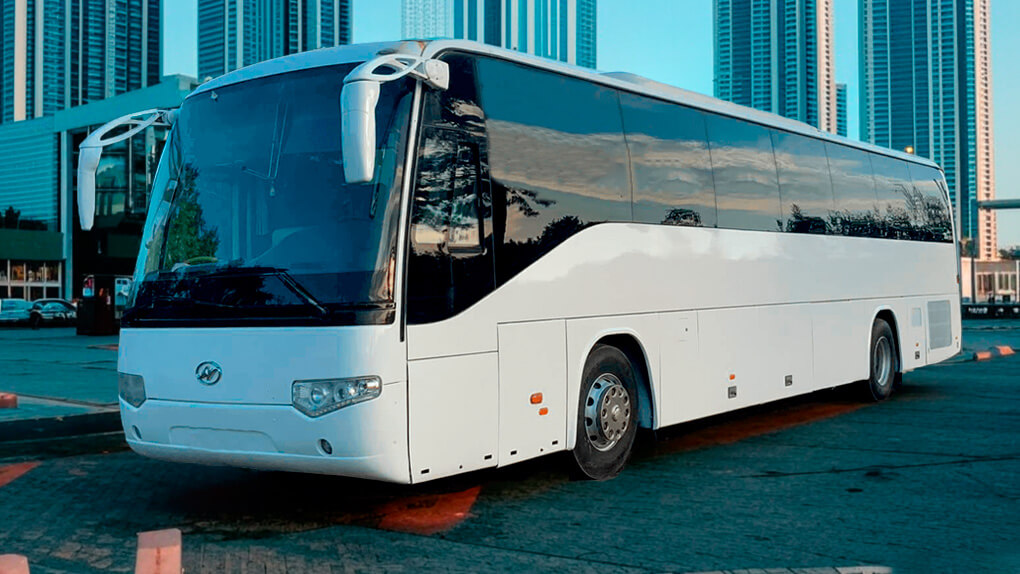 Higer 6129 with driver for rent 